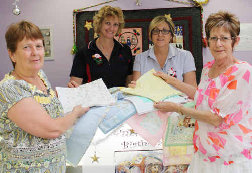 MADE WITH LOVE: Ladies from Emerald Patchwork and Quilters Group donate quilts to Emerald Hospital. rp-211210-005 MADE WITH LOVE: Ladies from Emerald Patchwork and Quilters Group donate quilts to Emerald Hospital. rp-211210-005
